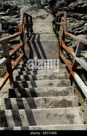 Concrete steps leading down to a beach. Stock Photo