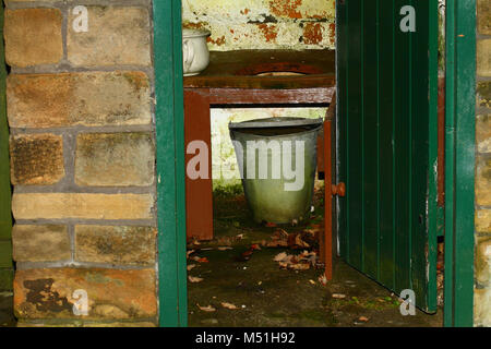 Old fashioned toilet block used in terraced houses in England in the early 20th century Stock Photo