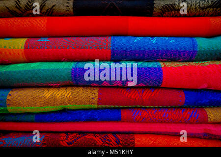 Beautiful and colorful Mexican fabrics for sale at market, Latin America, fabric background Stock Photo