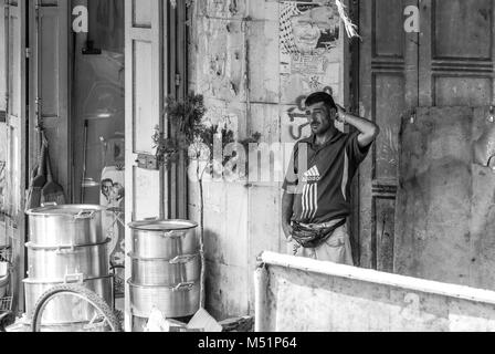 HEBRON, ISRAEL - AUGUST 04, 2010: Black and white picture of palestinian man in Hebron, Israel. Stock Photo