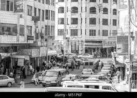 HEBRON, ISRAEL - AUGUST 04, 2010: Black and white picture of car traffic in Hebron, Israel. Stock Photo