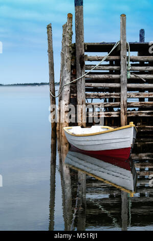 Rowboat dinghy tied to dock in Maine Stock Photo - Alamy