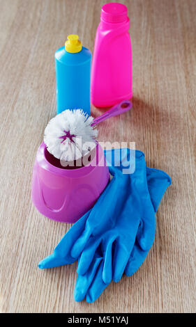 still life with a toilet brush and latex gloves Stock Photo