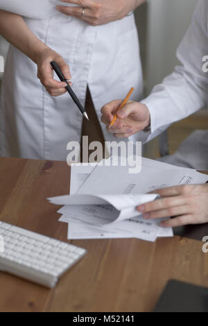 Two doctors discussing test results Stock Photo