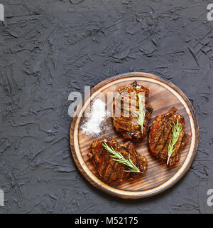 Sirloin steaks on plate Stock Photo