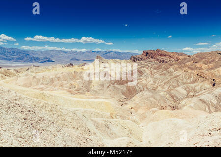 Panoramic view of mudstone and claystone badlands at Zabriskie Point. Death Valley National Park, California USA. Stock Photo