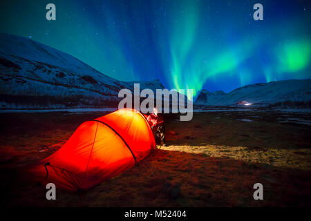 Northern Lights (Aurora borealis) over a tent in winter,Kungsleden or Königsweg,Province of Lapland,Sweden Stock Photo