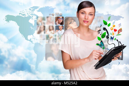 Young pretty woman using her universal device Stock Photo