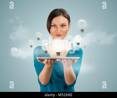 Woman sharing her idea using tablet computer Stock Photo