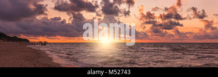 Panorama of a beach sunset over Baltic sea Stock Photo