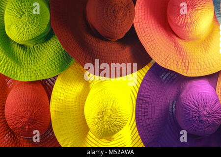 WOMAN HATS IN A FLEA MARKET. Stock Photo