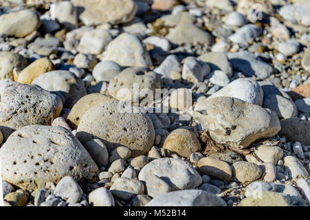 Large pebbles are shot close-up Stock Photo