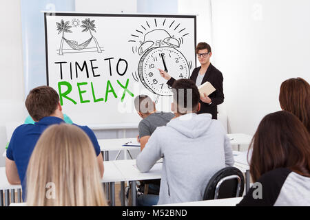 Teacher Giving Time To Relax Lecture Students Stock Photo