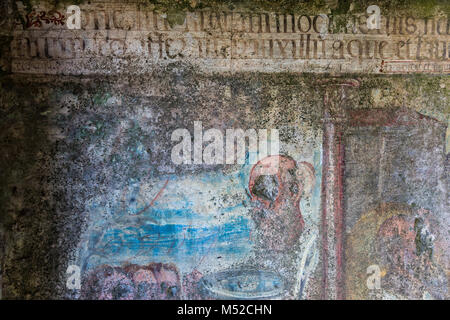 Caceres, Spain. - February 18, 2018: Frescoes and paintings very deteriorated in the ruins of the old hermitage of San Jorge. Caceres. Extremadura. Sp Stock Photo