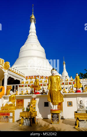 Details and sculptures of the beautiful white Pagoda, located on an island in Kan Thar Yar Lake Stock Photo