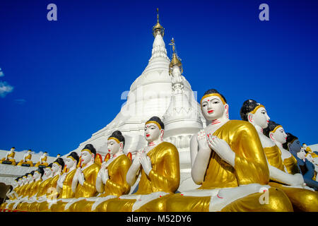 Details and sculptures of the beautiful white Pagoda, located on an island in Kan Thar Yar Lake Stock Photo