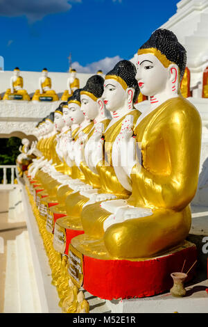 Details and sculptures of the beautiful white Pagoda, located on an island in Kan Thar Yar Lake Stock Photo