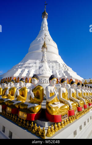 Details and sculptures of the beautiful white Pagoda, located on an island in Kan Thar Yar Lake Stock Photo