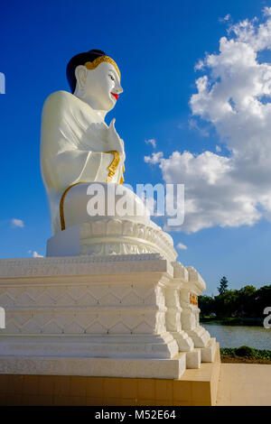 Details and sculptures of the beautiful white Pagoda, located on an island in Kan Thar Yar Lake Stock Photo