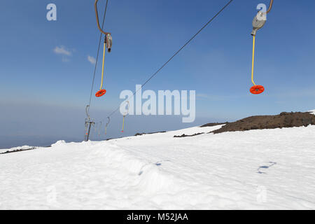 Alpine ski lift at Etna ski resort. Sicily, Italy. Stock Photo