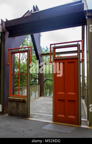 Foundation Park Monument in Sydney Entrance. Red door and window leading to empty room Stock Photo