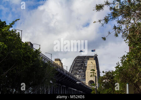 Different view of Sydney Harbour bridge with two australian flags on top Stock Photo