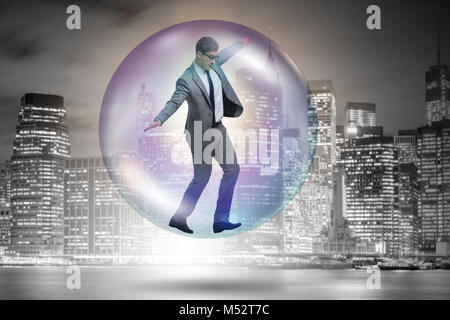 Businessman flying inside the bubble Stock Photo