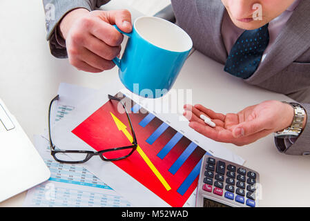Finance analyst feeling sick due to bad results Stock Photo