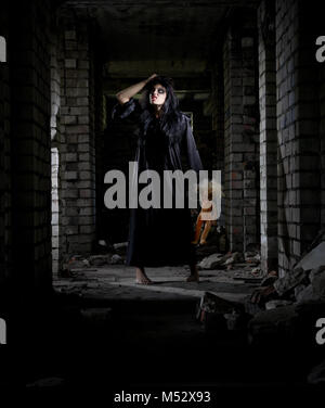 Zombie girl in old dirty house Stock Photo