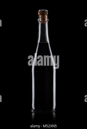Homemade bottle of red wine with cork on black background Stock Photo