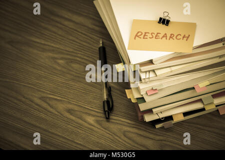 Research; The Pile of Business Documents on the Desk Stock Photo