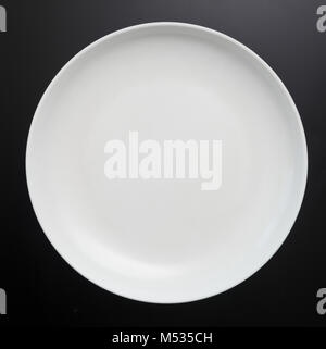 plate on black Stock Photo
