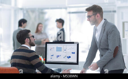 two businessmen analyzing stats financial data Stock Photo