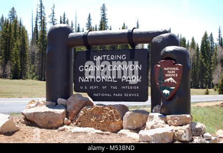 The new entrance sign is a replica of the original design. Work was completed in time for the 2012 season.  Grand Canyon National Park North Rim Entrance Sign . Stock Photo