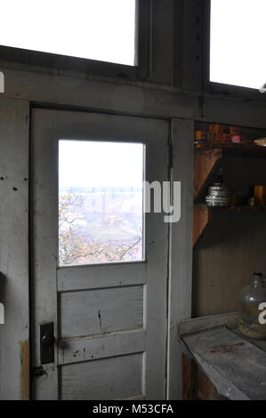 Grand Canyon History Symposium Historic Kolb Studio . View of backdoor in photography studio with view of canyon through door window. [Grey backdoor with Stock Photo