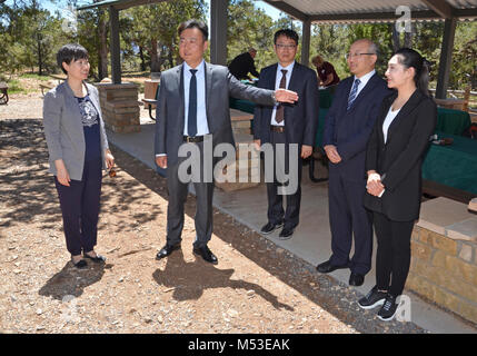 Grand Canyon Renews Sister Park Agreement with China's Yuntaishan World. Yang qingjiu, Executive Vice Mayor of Jiaozuo City, introduces his colleagues Li jianyang, Vice Director of the Tourism Bureau of Jiaozuo City, and Xin ying, section chief of Foreign and Overseas Chinese Affairs Office of Jiaozuo City.  Grand Canyon National Park and Yuntaishan Geopark from the Henan province of China renewed their five-year Sister Park Agreement on Tuesday, May 23, 2017.  The ag Stock Photo