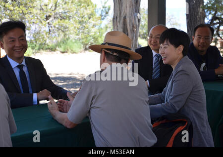 Grand Canyon Renews Sister Park Agreement with China's Yuntaishan World. Brian Drapeaux, Deputy Superintendent of Grand Canyon National Park, discusses the challenges and benefits of high visitation with Yang qingjiu, Executive Vice Mayor of Jiozuo City, Li jianyang, Vice Director of the Tourism Bureau of Jiaozuo City, and Wei dongying, professor at Beijing Normal University.  Grand Canyon National Park and Yuntaishan Geopark from the Henan province of China renewed t Stock Photo