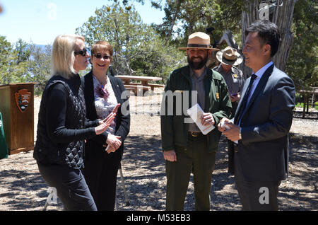 Grand Canyon Renews Sister Park Agreement with China's Yuntaishan World. Laura Chastain and Freda Rahnenfuehrer, representatives from the Tusayan Chamber of Commerce meet Yang quinjiu, Executive Vice Mayor of Jiaozuo City.   Grand Canyon National Park and Yuntaishan Geopark from the Henan province of China renewed their five-year Sister Park Agreement on Tuesday, May 23, 2017.  The agreement allows for an intellectual exchange, international cooperation, and support f Stock Photo