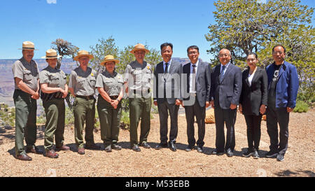 Grand Canyon Renews Sister Park Agreement with China's Yuntaishan World. Here is a group photo showing the park managers who participated in a signing ceremony that renewed Stock Photo