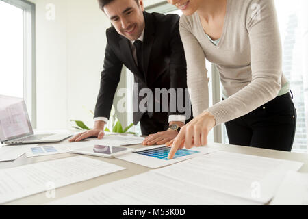 Architects colleagues working together on project Stock Photo