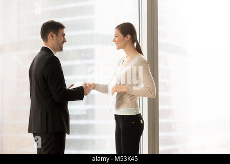 Female company secretary meeting client in office Stock Photo