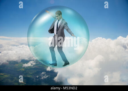 Businessman flying inside the bubble Stock Photo