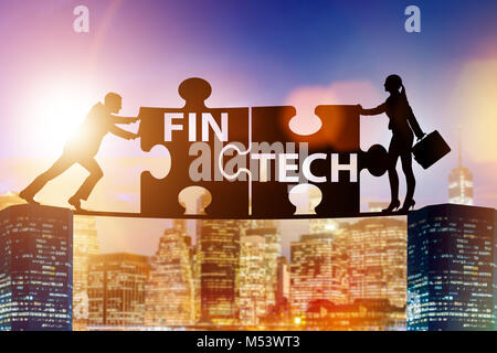 Fintech financial technology concept with puzzle pieces Stock Photo