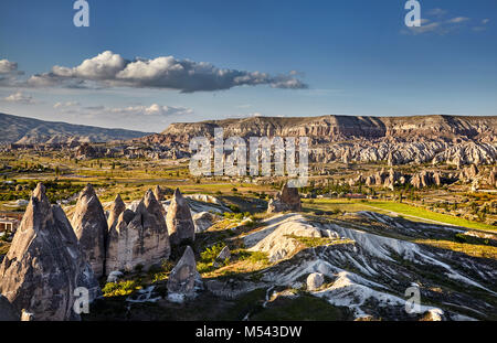 Beautiful landscape of ancient geological formation called fairy chimneys at sunset in Cappadocia valley, Turkey Stock Photo