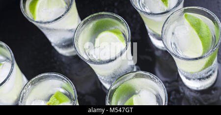 Cocktail. Vodka, gin, tequila with lime Stock Photo