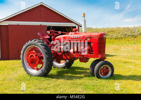 Bar u ranch  old red tractor Stock Photo