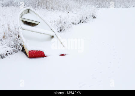 Rowing boat on the beach in the winter Stock Photo