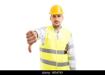 Disappointed foreman or constructor showing thumb down gesture as negative disapproval concept Stock Photo