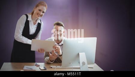 Business couple working on computer Stock Photo