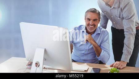 Businessmen working on computer Stock Photo
